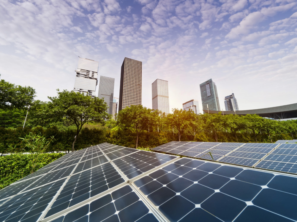 Ecological energy renewable solar panel plant with urban landscape landmarks